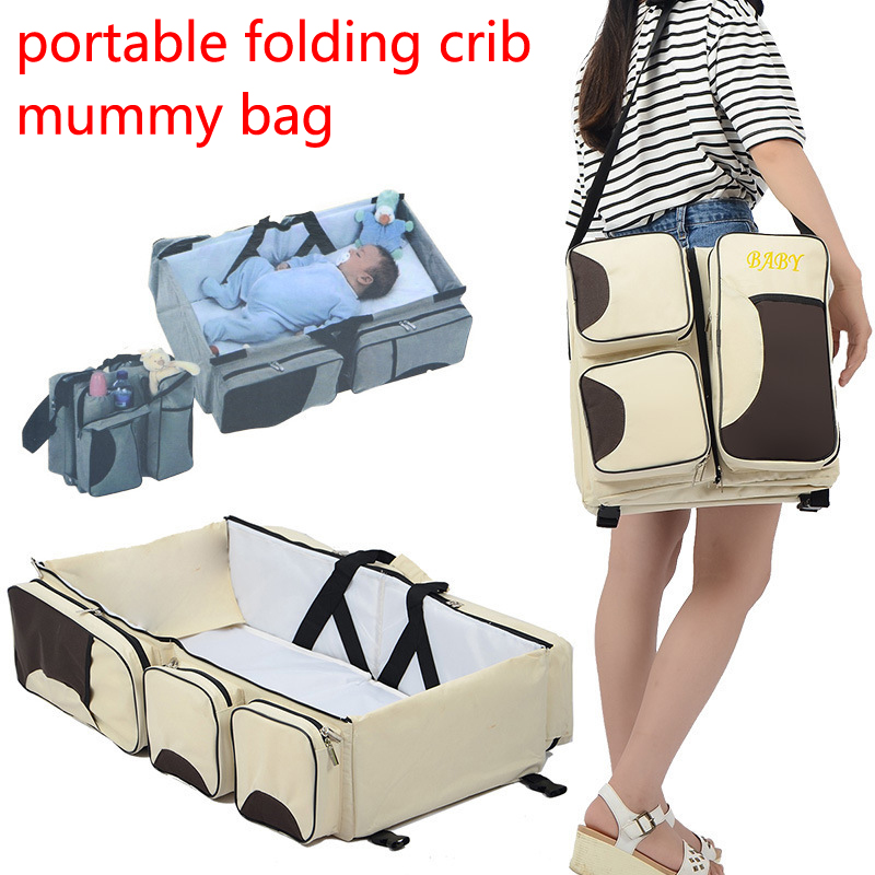 travel mommy bag and crib
