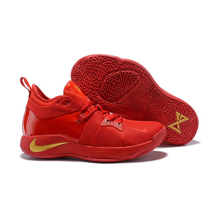 red and gold basketball shoes