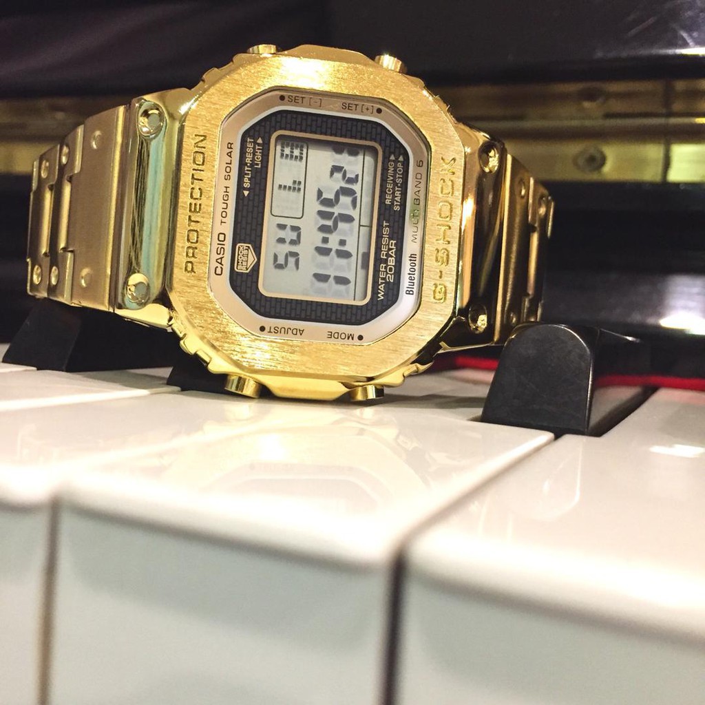 g shock dw 5600 gold