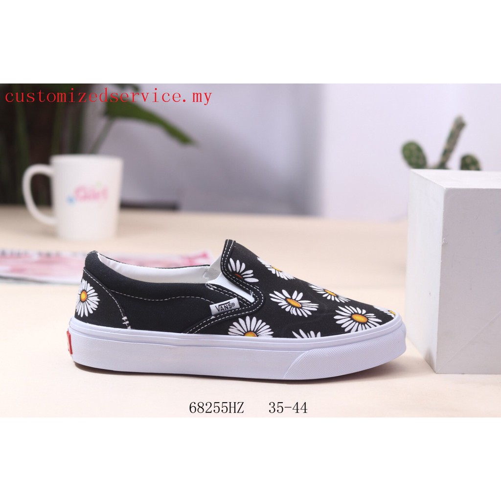 vans era big daisies