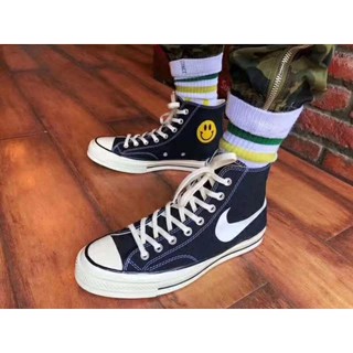 chuck taylor with nike swoosh