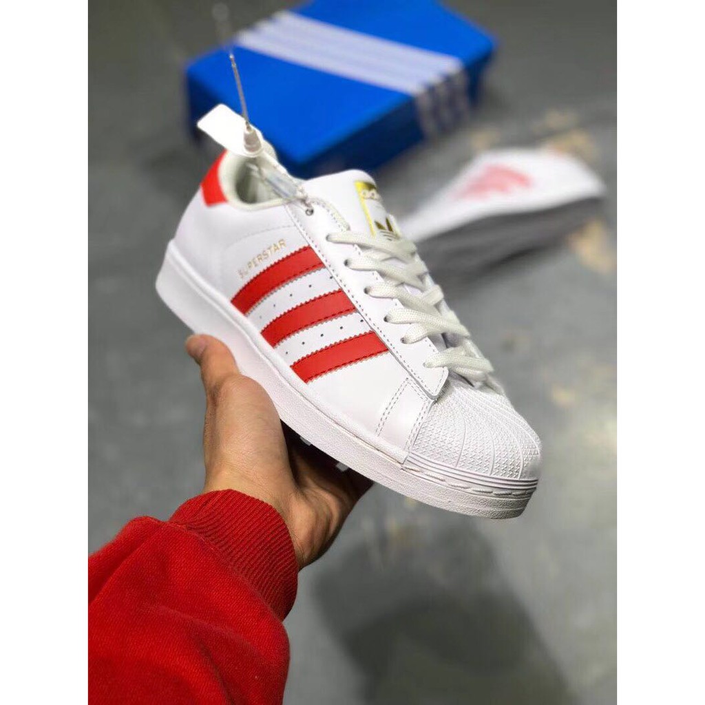 adidas shell toe red stripes