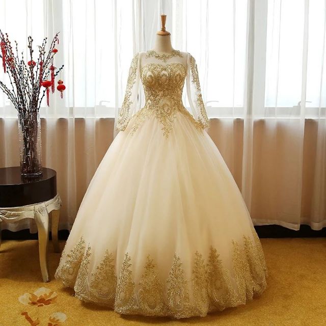 white and gold lace wedding dress