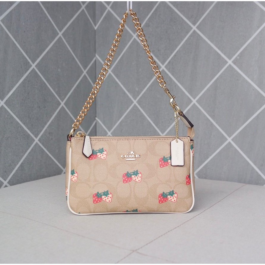 strawberry coach purse