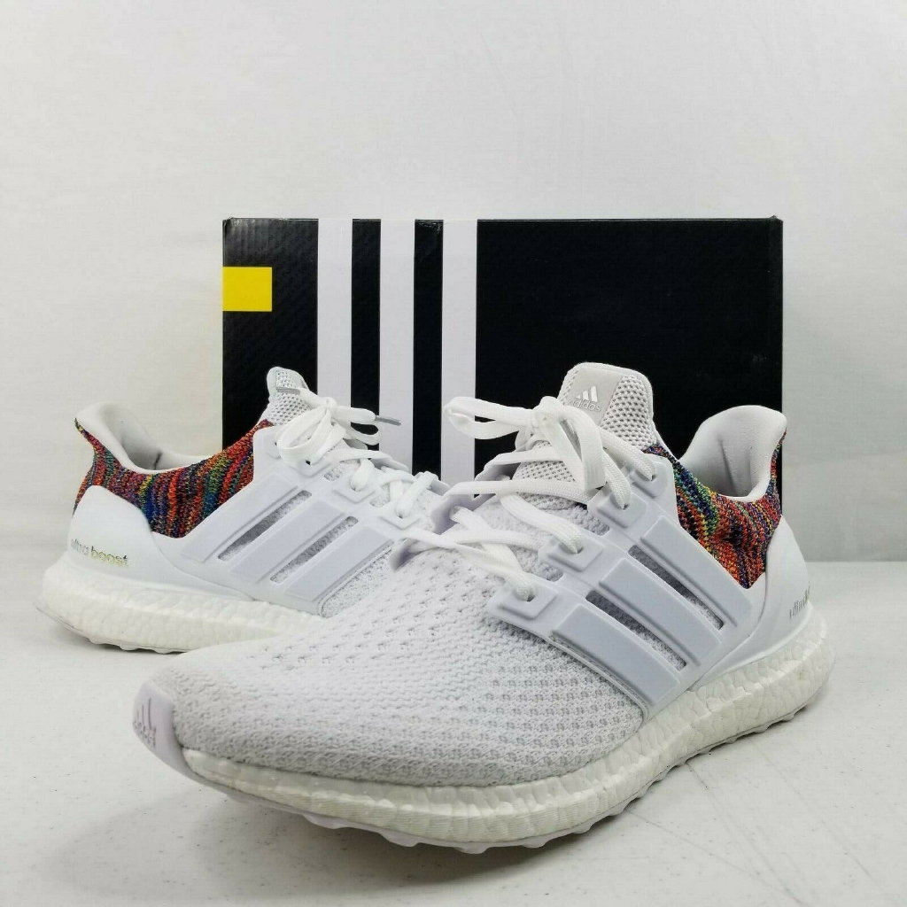 white adidas boost with rainbow