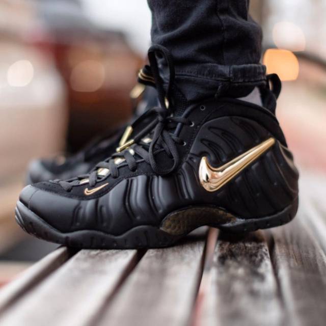 nike foamposite black and gold