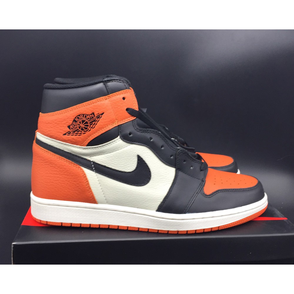 white orange jordan 1