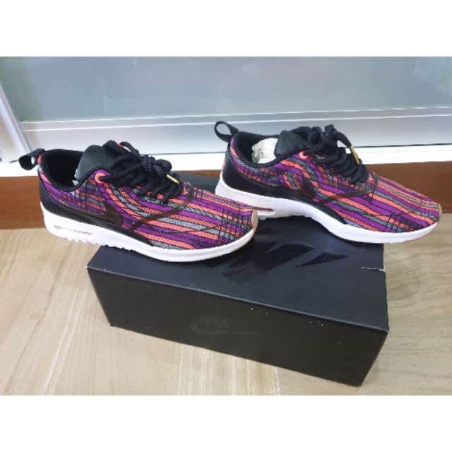 nike thea size 5