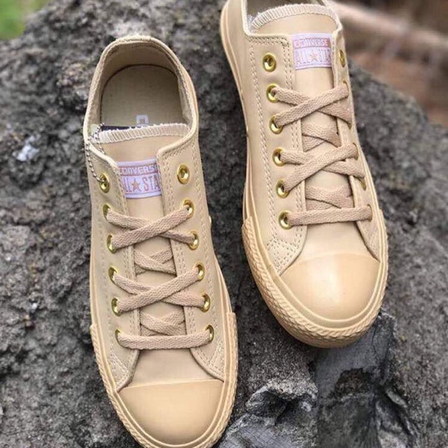 beige converse leather