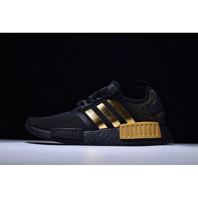 black and gold nmd adidas