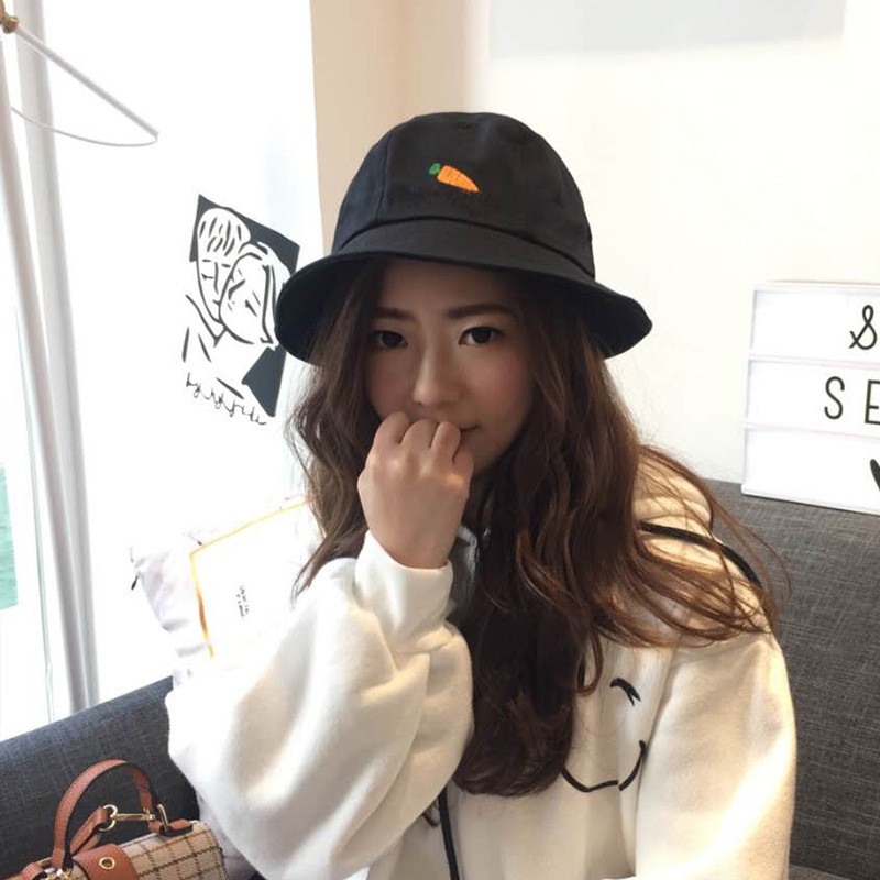 women in bucket hats