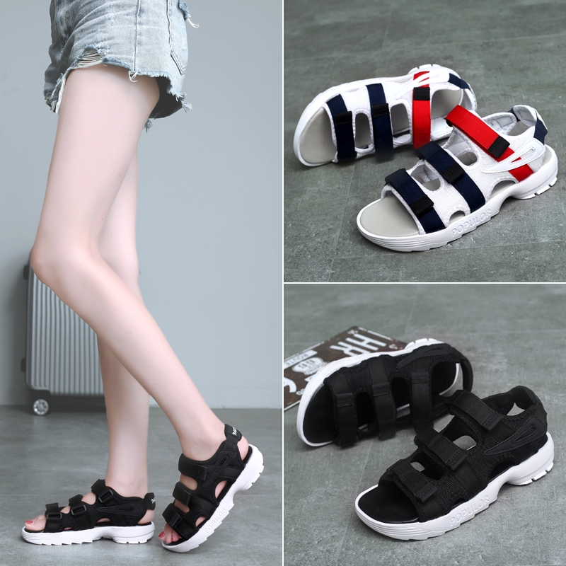 fila sandals on feet