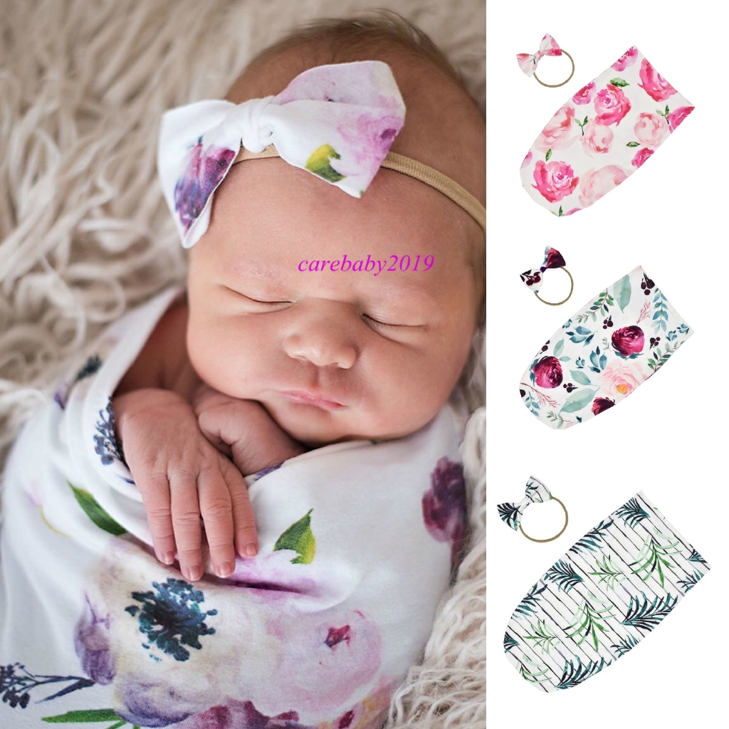 newborn baby girl swaddle