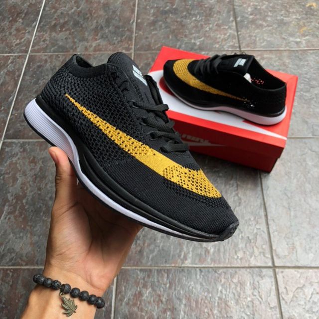 nike flyknit racer gold