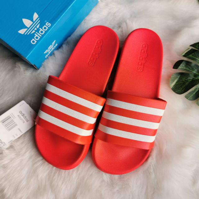 red adidas sliders