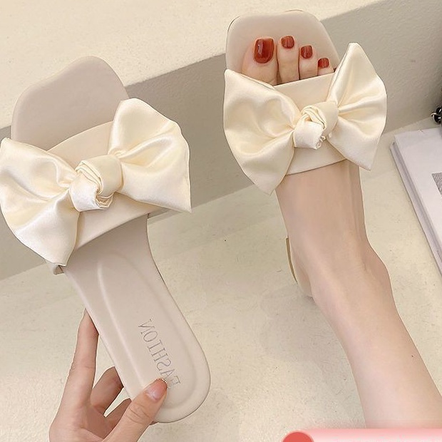 #New Roman high heeled shoes in 2021 summer#ins仙女风一字带中跟凉鞋女2021夏季新款罗马高跟鞋粗跟百搭女鞋仙女风海边度假凉拖鞋女2021夏天外穿小清新大蝴蝶结平底软妹凉拖