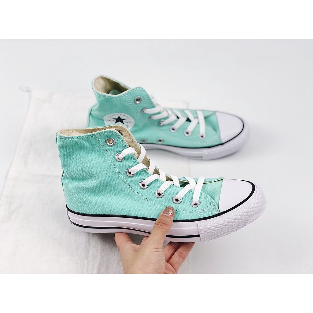 mint green canvas shoes