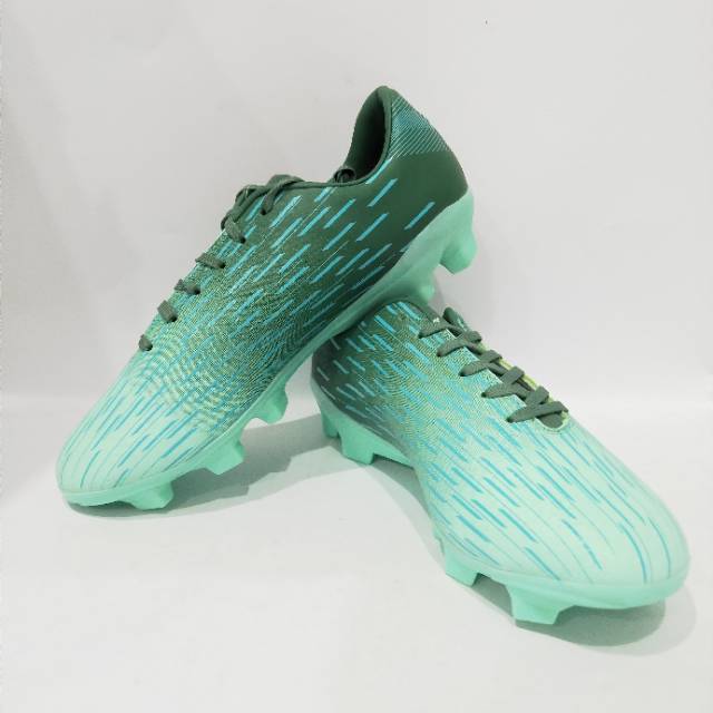 mint green football boots