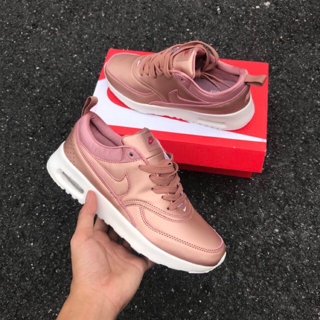 nike thea rose gold