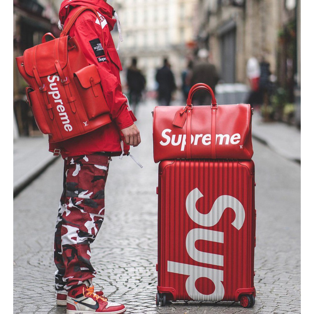 supreme red luggage