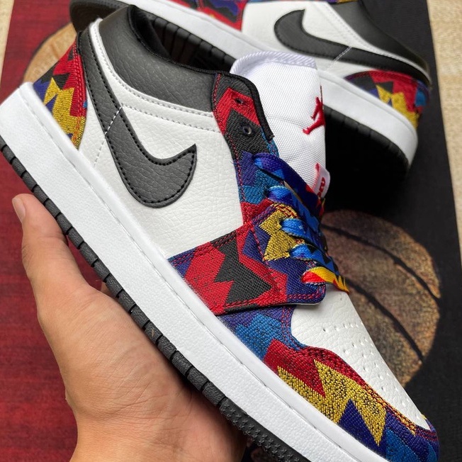 jordan 1 low nothing but net on feet