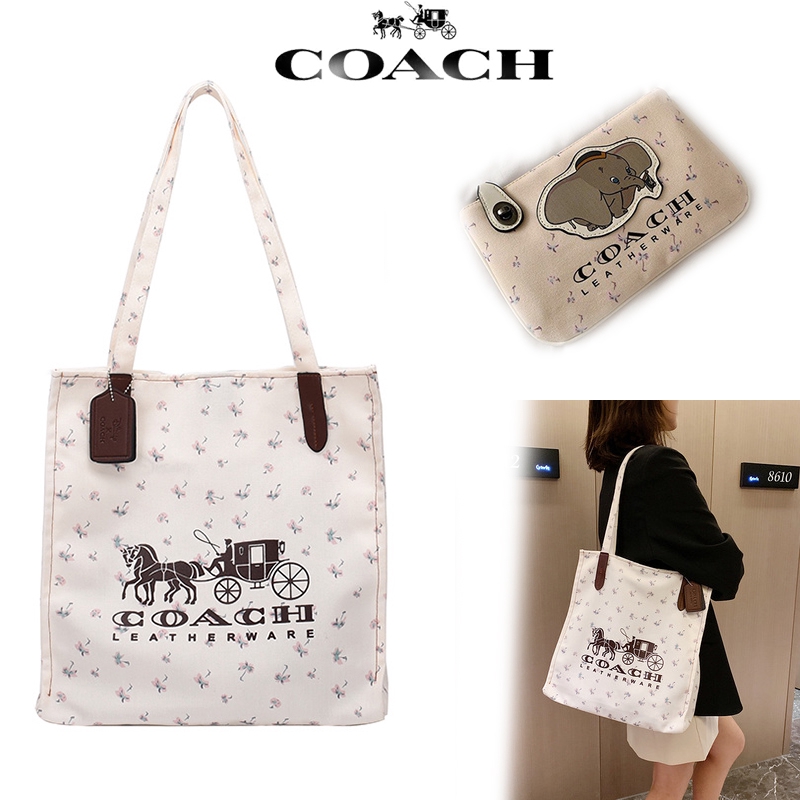 coach canvas sling bag