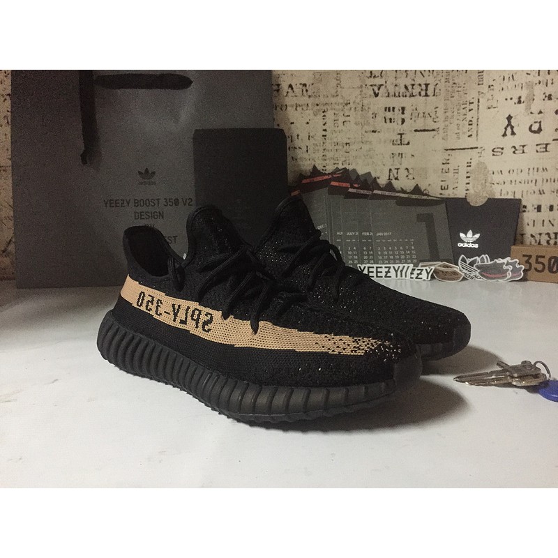 yeezy shoes black and gold
