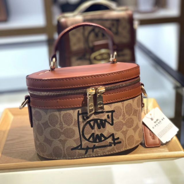 coach signature trail bag