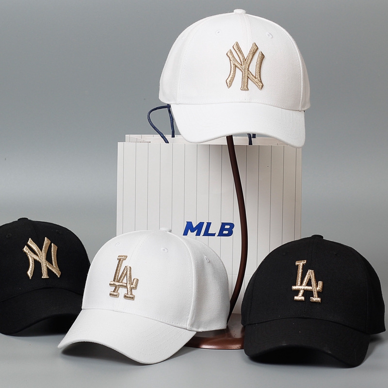 white and gold hat