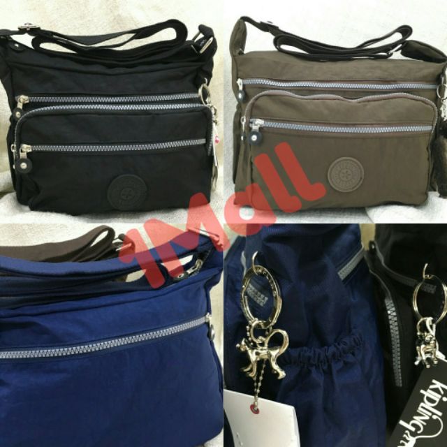 multi compartment cross body bag