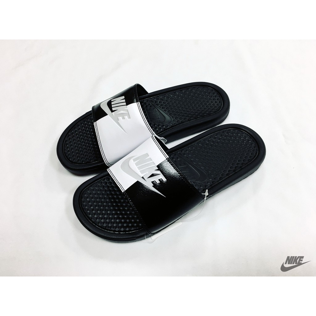 nike slides half black half white