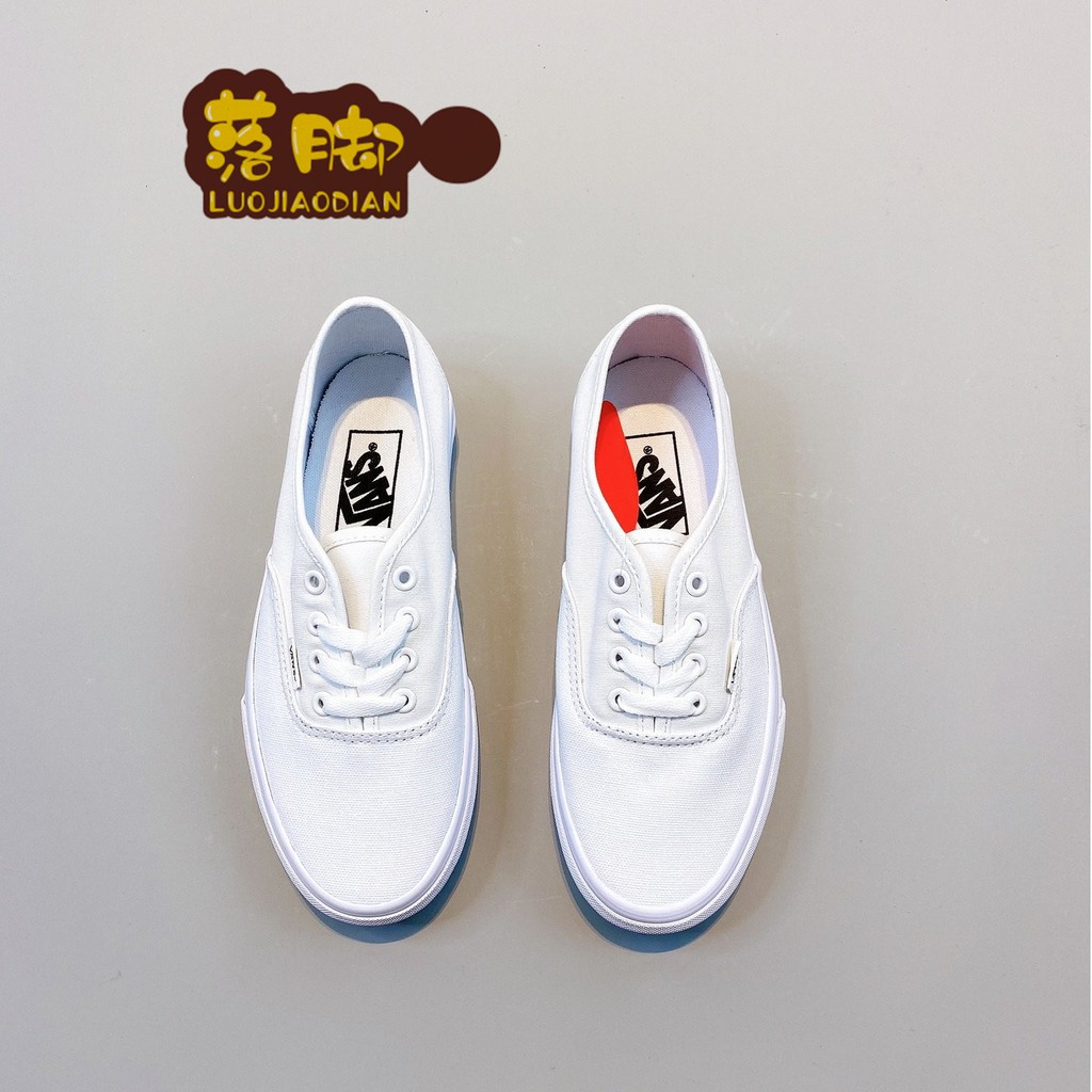 white vans running shoes