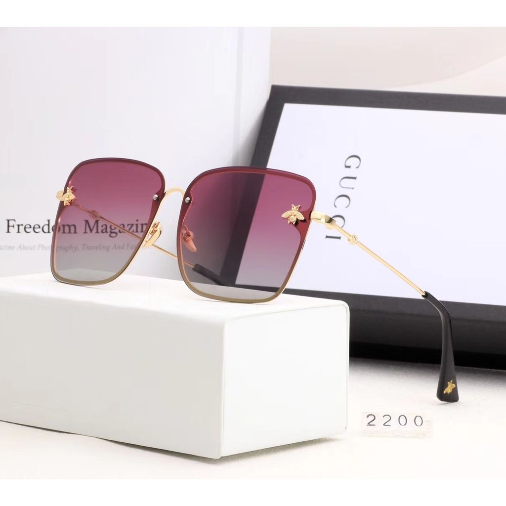 gucci sunglasses with bee in middle