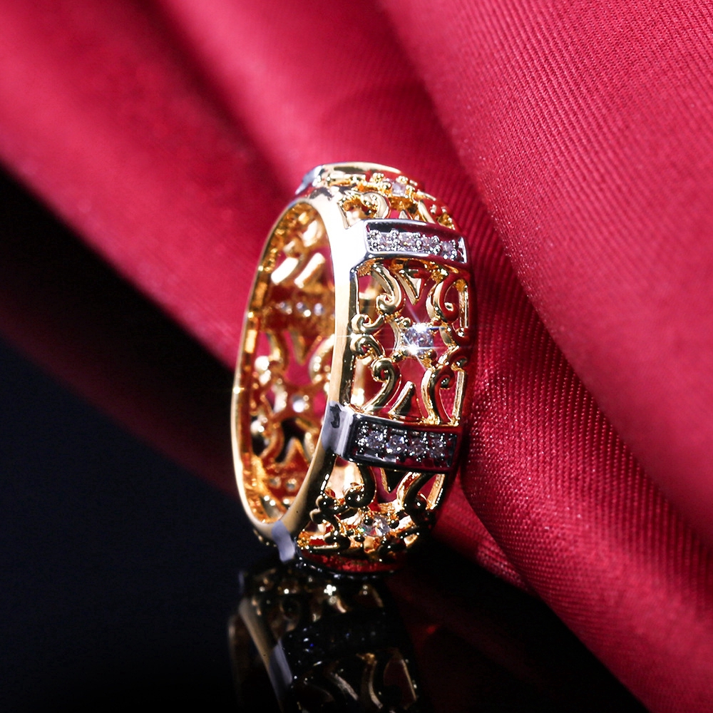 Anello vintage a fiore con zircone in oro antico intagliato_voghion.com