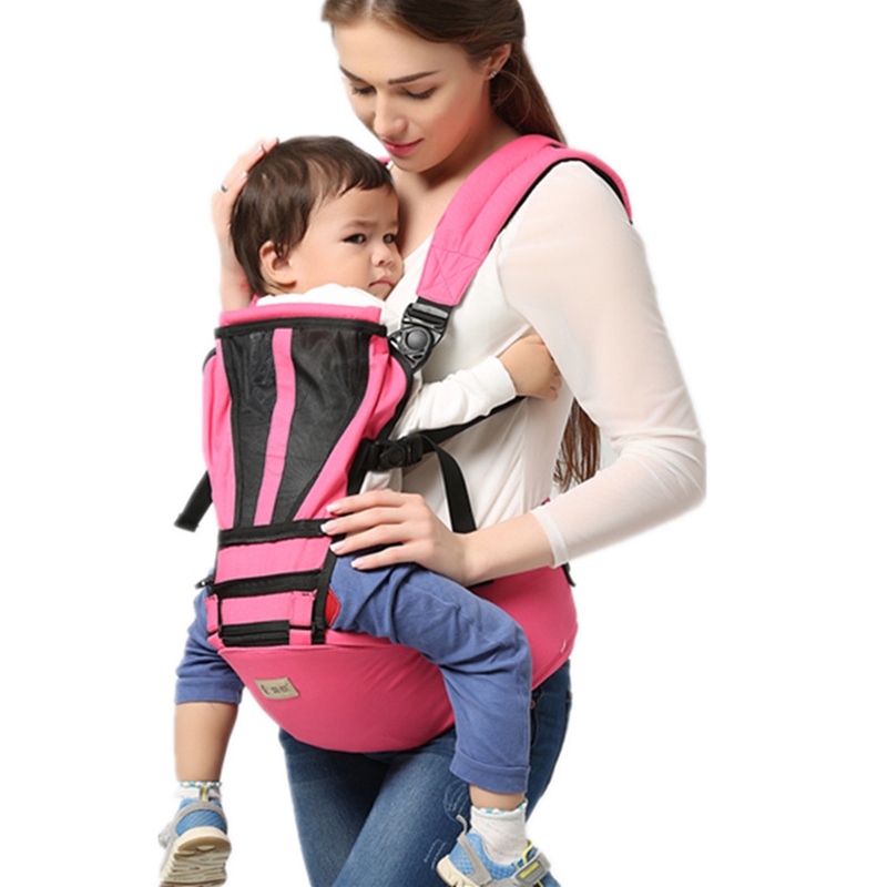 baby holding bag