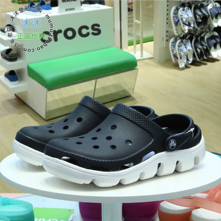 black crocs with white stripe