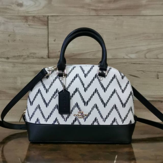 coach alma sling bag