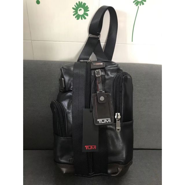 tumi sling bag leather