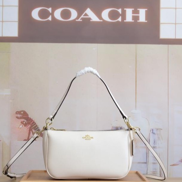 coach sling bag white