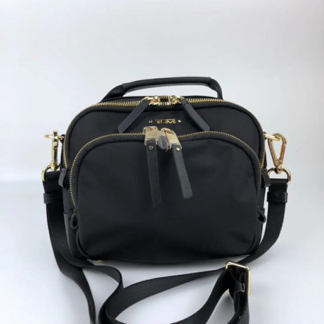 tumi sling bag ladies