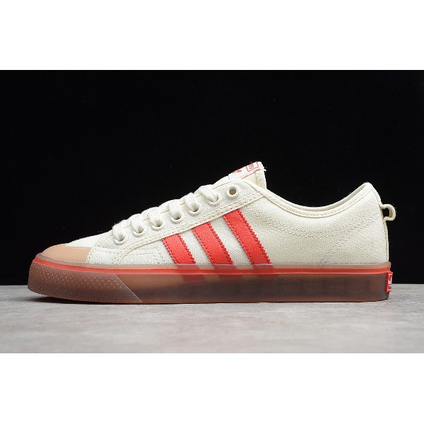 adidas originals nizza canvas sneakers in white and red