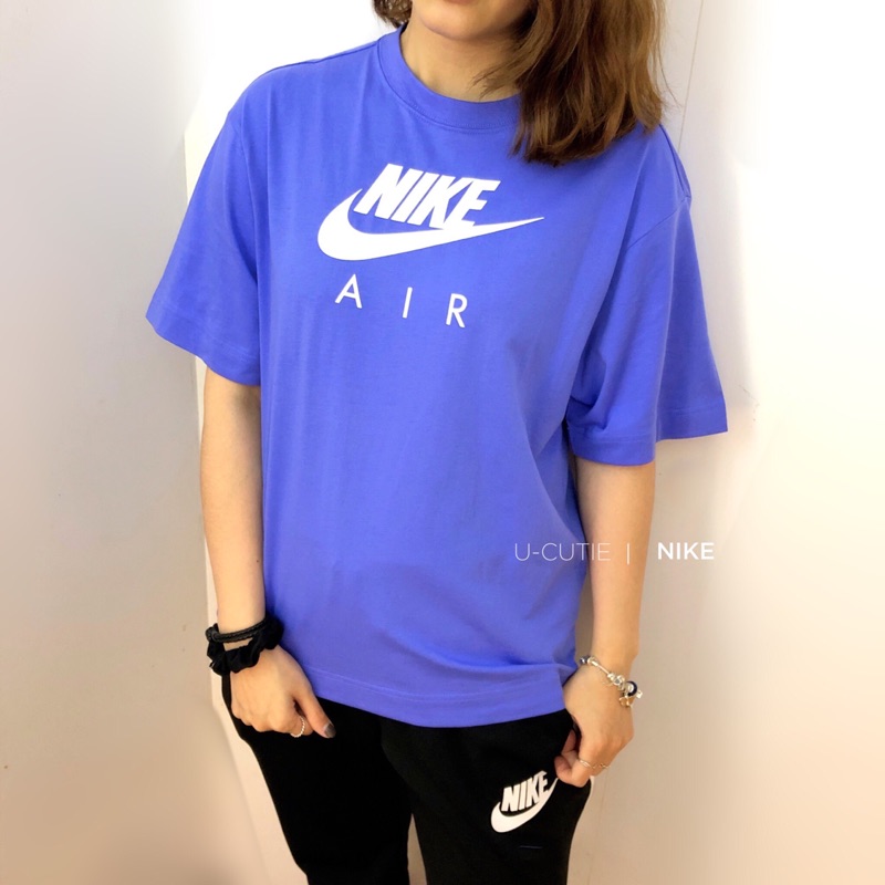 blue pink and purple nike shirt