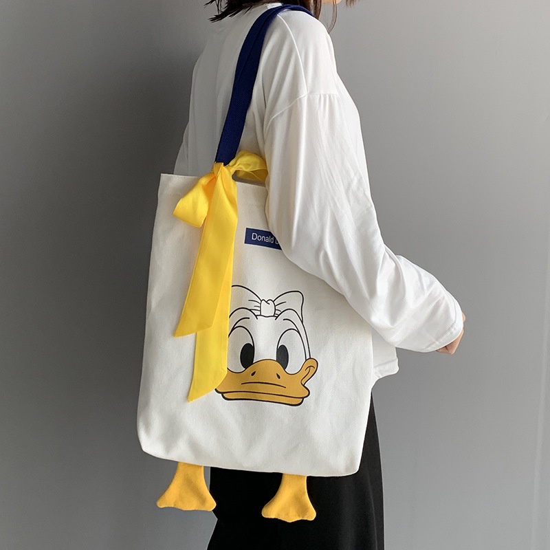 Bag female new trendy ins little yellow duck cute student tutoring handbag cloth bag large capacity ulzzang net red canvas shoulder bag environmental protection strap shopping bag