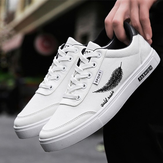 boys white canvas sneakers