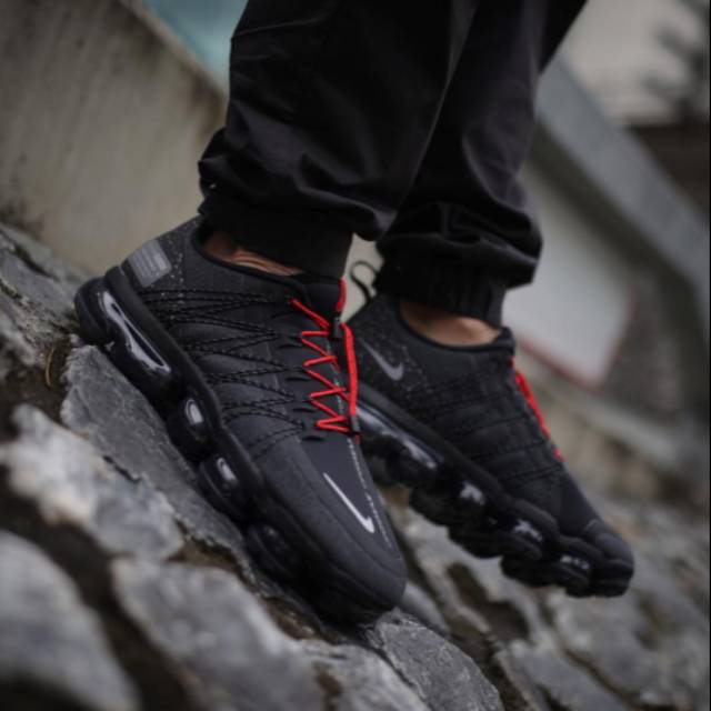 black and red vapormax utility