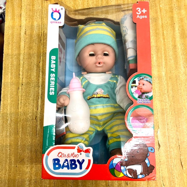 baby doll with bottle and diaper