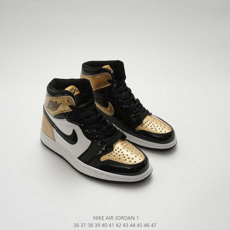 white and gold nike high tops