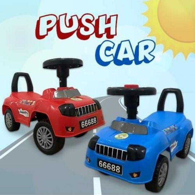 boys push car