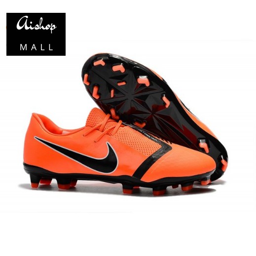 orange and black nike cleats