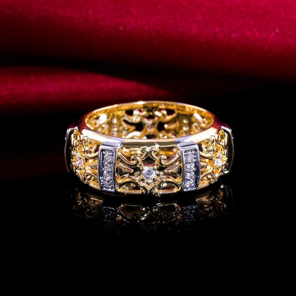 Anello vintage a fiore con zircone in oro antico intagliato_voghion.com